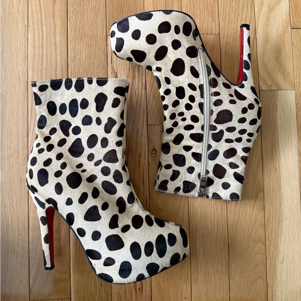 Christian Louboutin Leopard printed ponyskin platform shoots in size 38 (US 8)